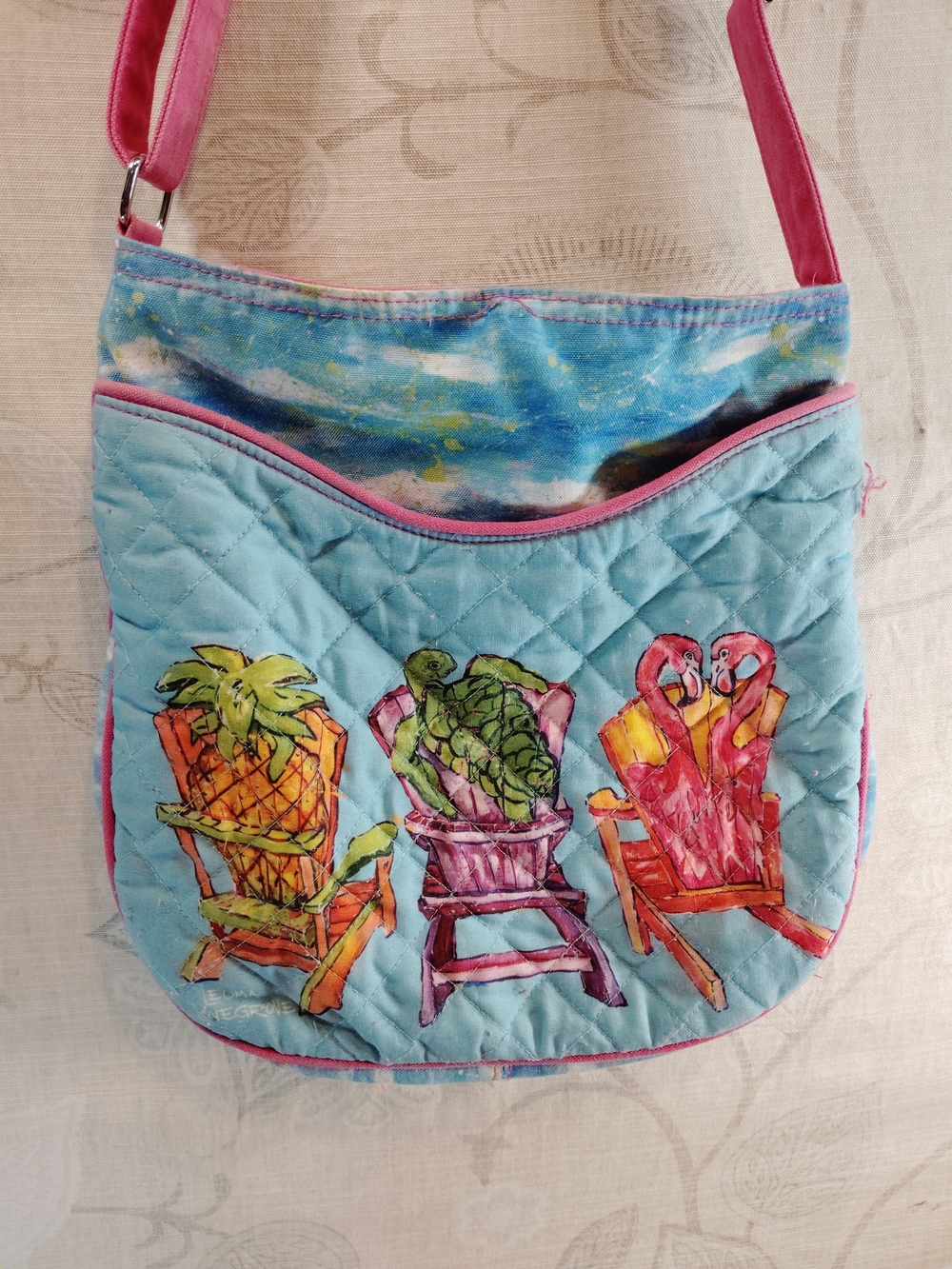 Leoma Lovegrove Blue Quilted Crossbody Bag with Tropical Chair Artwork